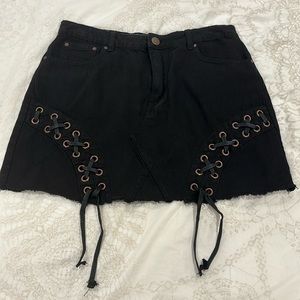 Size 10. Black denim mini skirt. Tobi